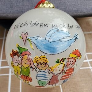 SALLY HUSS BLOWN GLASS CHRISTMAS ORNAMENT, "ALL CHILDREN WISH FOR PEACE"